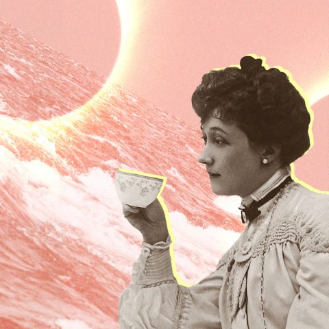 woman drinking tea with eclipse and ocean
