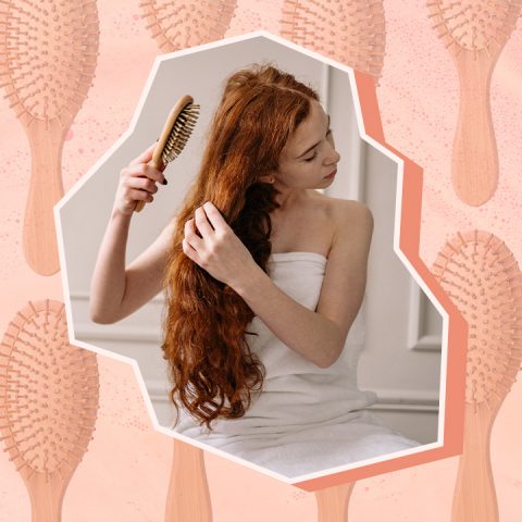 woman brushing hair on top of brush pattern