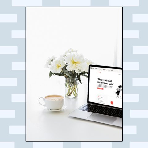 Notion website on a computer background