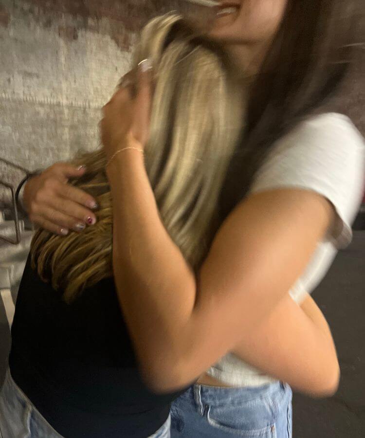 reconnecting with an old friend with a hug