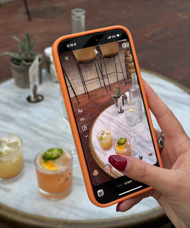 phone capturing photo of drinks